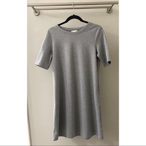 Lila Rose, slate grey, size medium, has pockets.